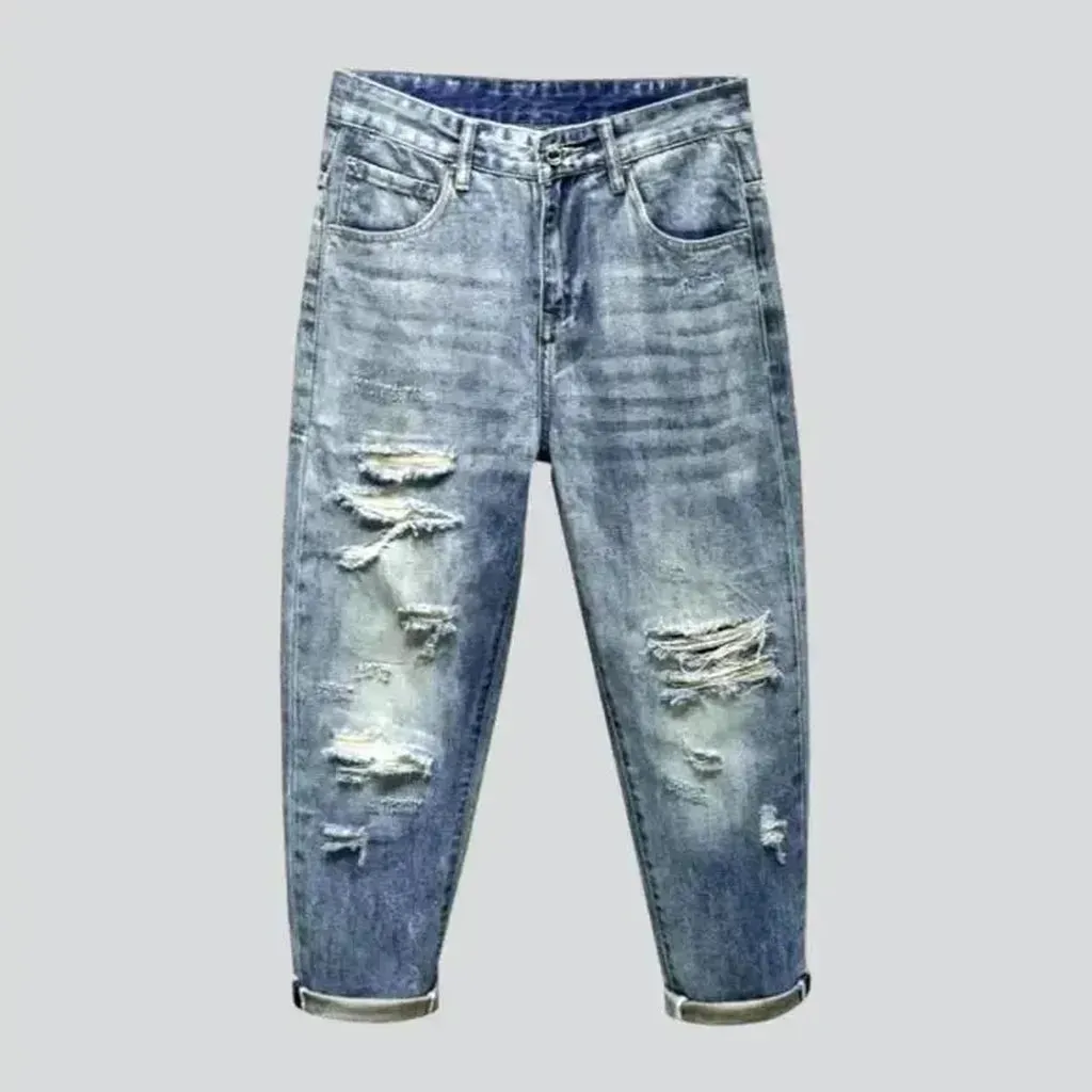 Medium-wash men's grunge jeans