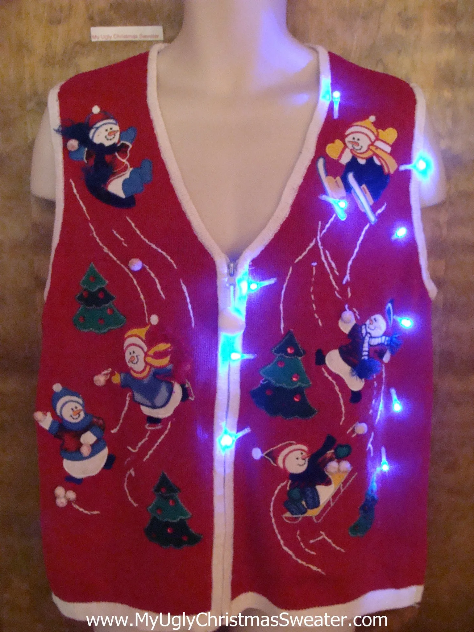 Snowmen Doing Winter Sports Cute Christmas Sweater Vest with Lights