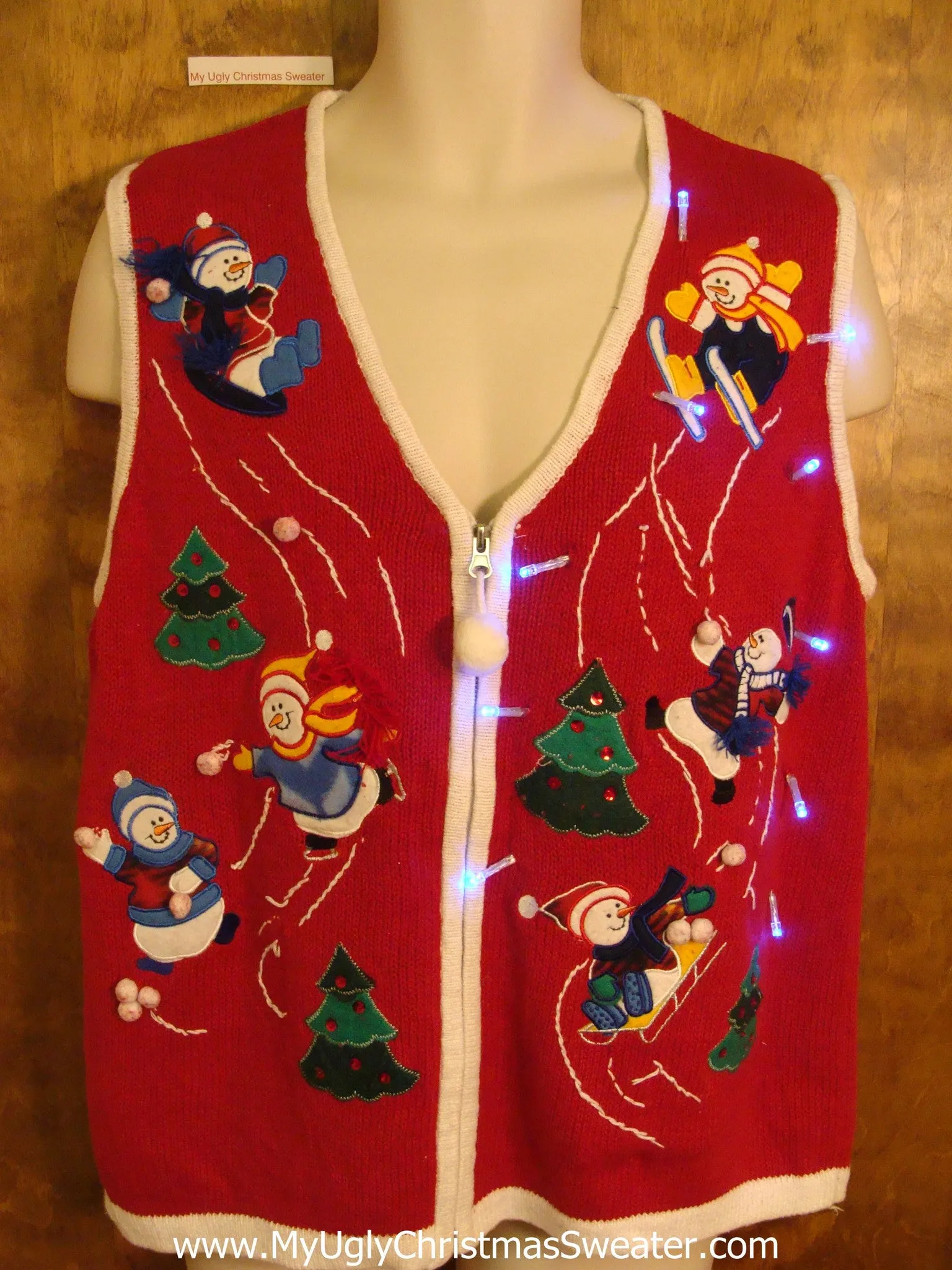 Snowmen Doing Winter Sports Cute Christmas Sweater Vest with Lights